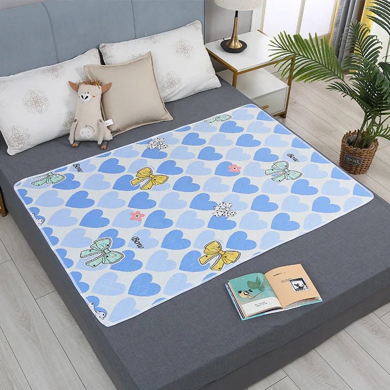 đïž Tapis ImpermĂ©able Lavable pour BĂ©bĂ© â 50x70 cm â Motifs Cartoon â Protection Urinaire & Changeâą - PlanĂšte bĂ©bĂ©