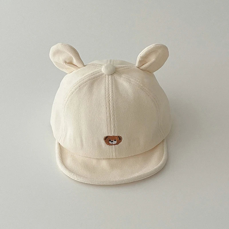 đ§ą Casquette BĂ©bĂ© "Petit Ours" â Avec Oreilles â Coton Respirant â Protection Soleil â Look Kawaii & Confort Assuré⹠- PlanĂšte bĂ©bĂ©