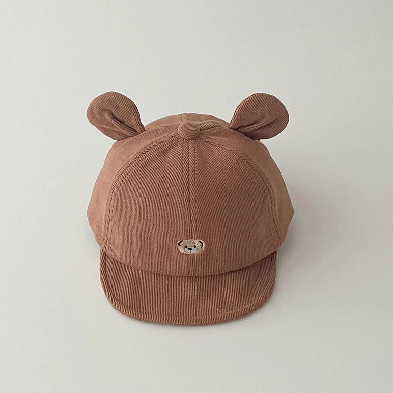 đ§ą Casquette BĂ©bĂ© "Petit Ours" â Avec Oreilles â Coton Respirant â Protection Soleil â Look Kawaii & Confort Assuré⹠- PlanĂšte bĂ©bĂ©