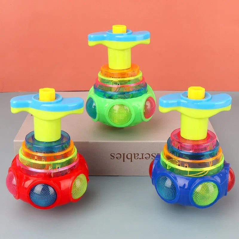🔮 Gyroscope Musical Lumineux – Toupie Tournante avec Lumières LED & Musique – Couleur Aléatoire™ - Planète bébé