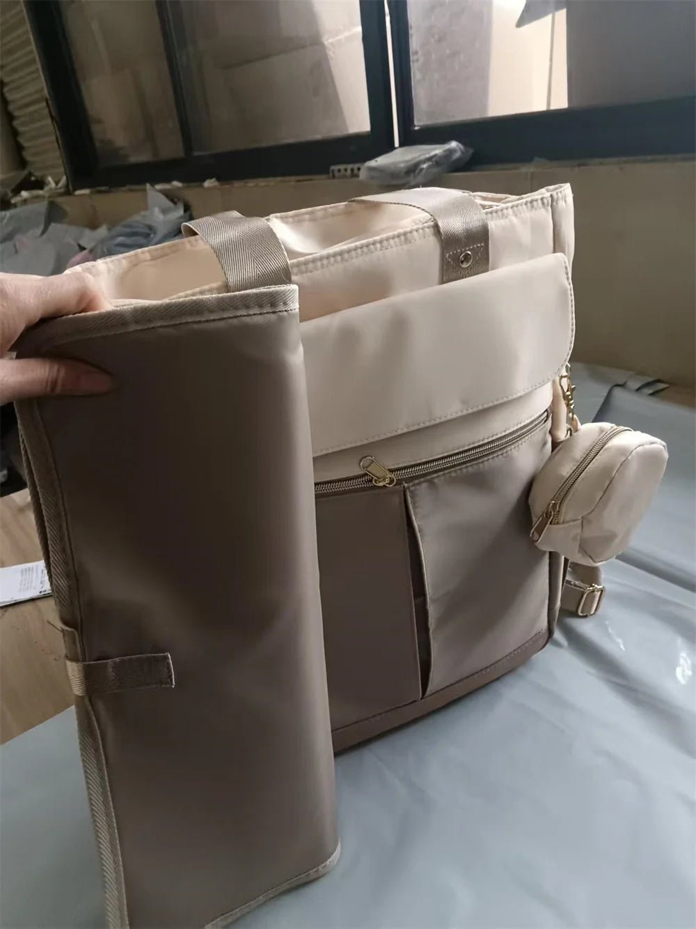 Sac à dos maternité étanche tapis à langer inclus - Planète bébé